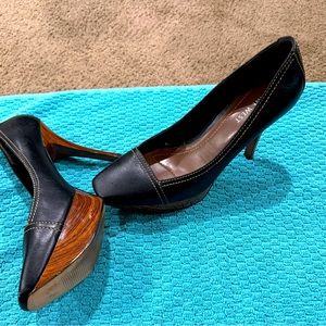 Awesome platform/wood pumps.